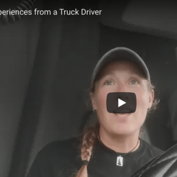 Thumbnail of female truck driver in Midwest Carriers truck cab