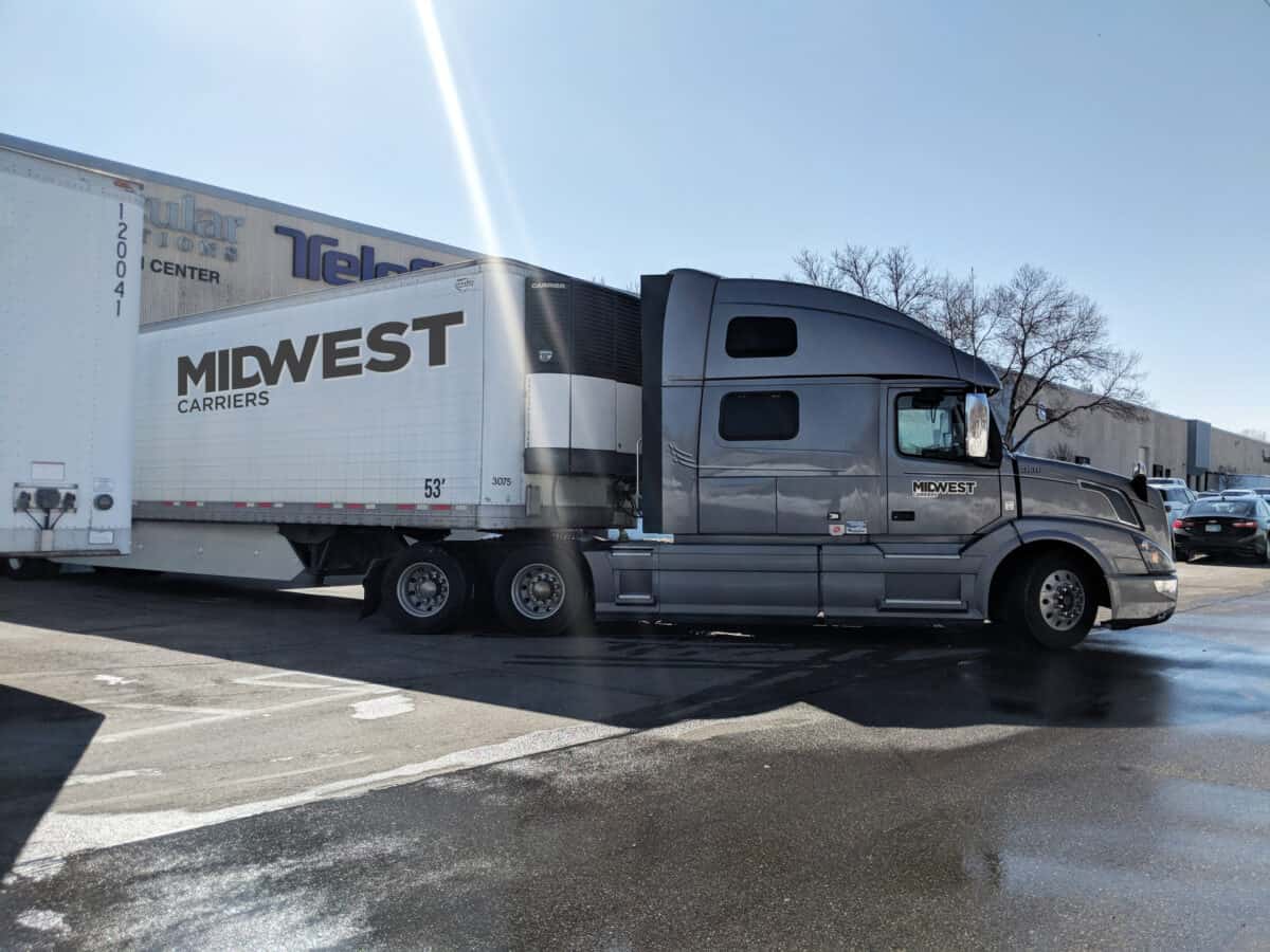 Midwest Carriers truck parked a the Midwest Carriers warehouse