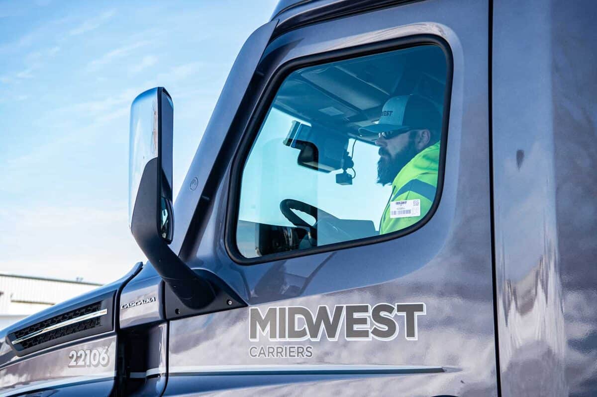 driver sitting in truck cab